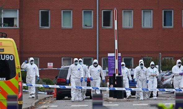 Liverpool attack: Police forensic officers working at the site outside the hospital 