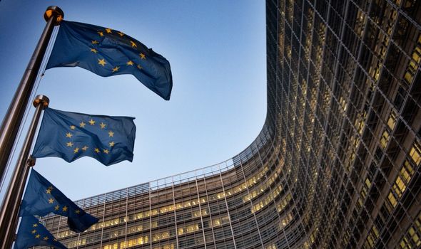 European flags wave in front of the Berlaymont building - European Commission (EC) headquarter - in Brussels,