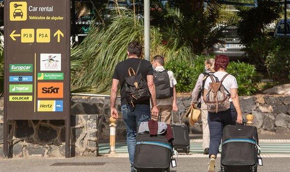 Tourists arriving at Tenerife airport