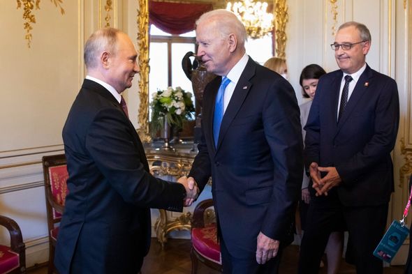 Biden and Putin shaking hands