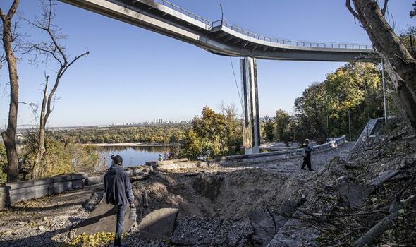 A damaged Klitchko Bridge and huge hole formed after the Russian missiles hit the capital Kyiv